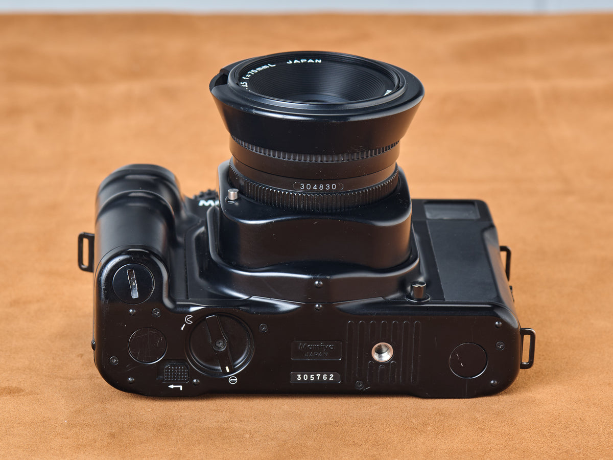 Mamiya 6 rangefinder film camera with 75mm lens. Serial number 305762 and 304830.