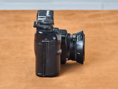 Mamiya 6 rangefinder film camera with 75mm lens. View of grip